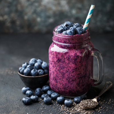 A purple smoothie in a glass